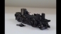 Preview: Märklin16-25-39596 Antrieb m.Vorlaufachse komplett