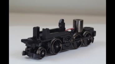 Preview: Märklin16-25-39596 Antrieb m.Vorlaufachse komplett
