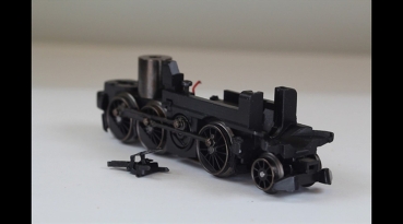 Preview: Märklin16-25-39596 Antrieb m.Vorlaufachse komplett