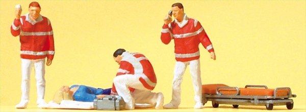 10543 Preiser Sanitäter und Verletzte auf Decke